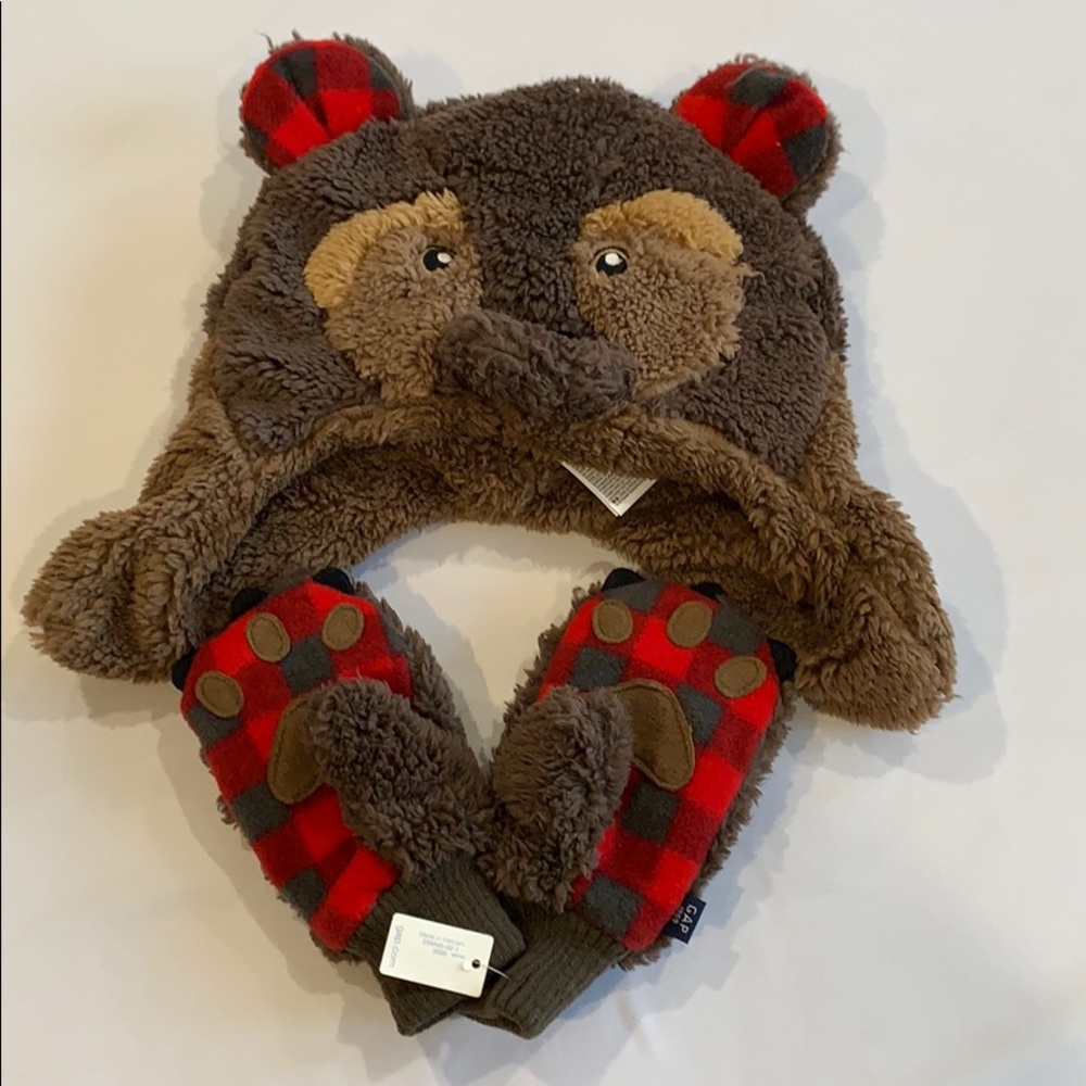 New mittens, hat worn once. Gap.